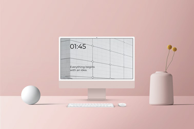 iMac Workspace with a Flower Vase and Decor