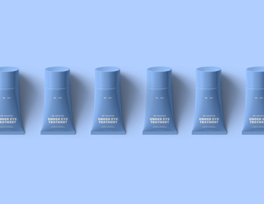 Six Cream Tubes on a Blue Background