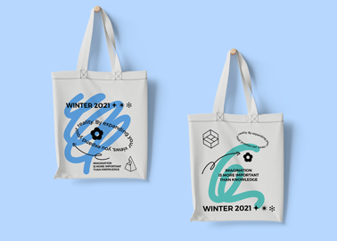 Two Tote Bags on a Blue Surface