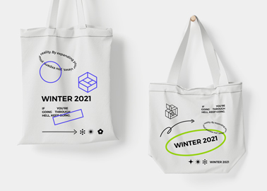 Zoomed Tote Bags on a White Surface