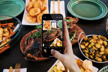 A Person Taking a Food Photo on an iPhone 13