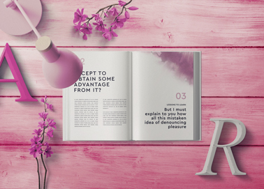 An Open Book on a Wooden Surface