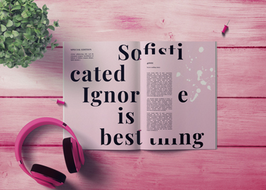 An Open Magazine With Headphones