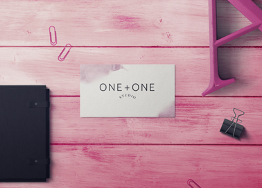 A Business Card and Other Stationery on a Desk