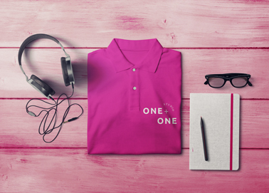 A Polo Shirt, Headphones, Glasses, and a Notebook