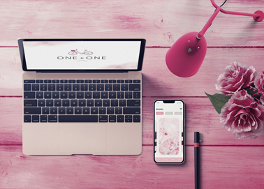 An iPhone With a Macbook High Angle View