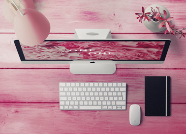 An iMac With a Lamp High Angle View