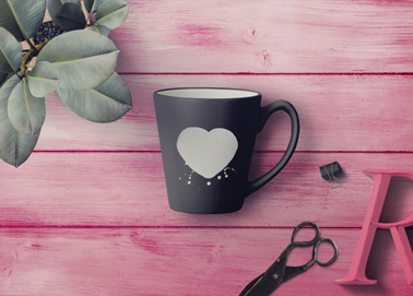 A Coffee Mug With Flowers and Stationery