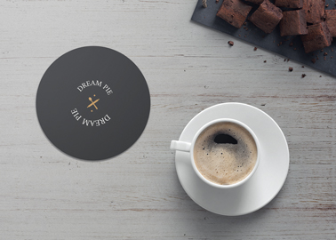 Cup of Black Coffee With a Coaster