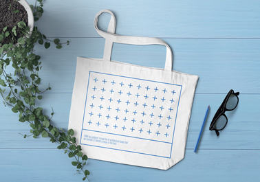 Sac fourre-tout avec une plante, un stylo et des lunettes