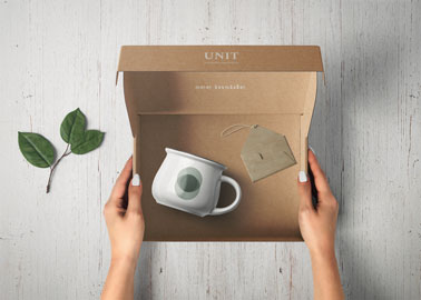 Open Box With a Mug Inside