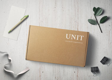 Paper Box With a Pen and Paper Clips