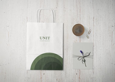 Paper Bag With a Card and Paper Pins