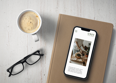 iPhone on a Notebook With Glasses 