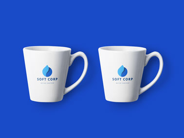 Two Coffee Mugs on a Blue Surface