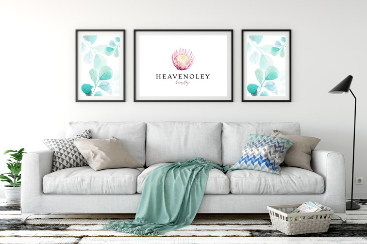 Three Frames Hanging Above an Elegant Sofa