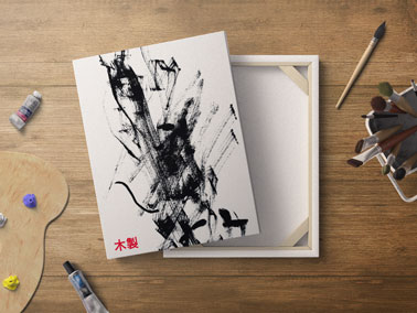 Open Box With Paints and Brushes