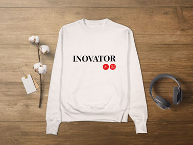 Sweatshirt With Headphones on a Wooden Table