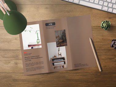 Open Brochure With a Pencil