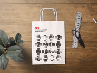 Paper Bag With a Plant, Scissors, and a Ruler