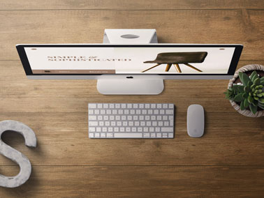 iMac on a Wooden Table High Angle View