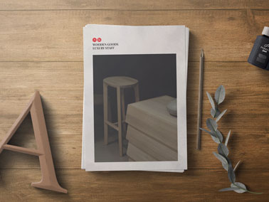 Stack of Brochures on a Wooden Surface