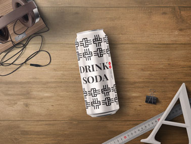 Drink Can With Headphones and Stationery