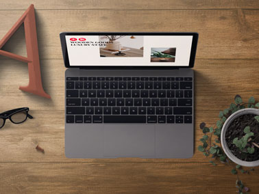 Open Laptop on a Wooden Table
