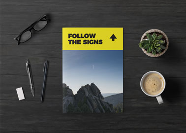 Magazine With Coffee, Glasses, and Pens