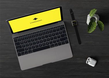 MacBook With AirPods and an iWatch