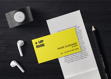 Business Card, AirPods, and a Candle