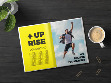 Open Magazine With a Coffee Mug and Pins