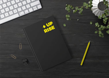 Notebook With a Pencil and Paper Pins