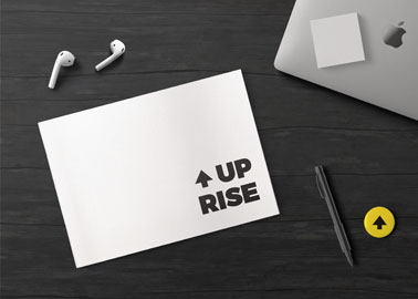 Piece of Paper With AirPods and a MacBook