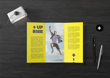 Brochure With a Lamp and Pens
