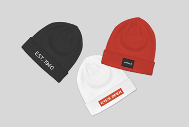 Three Beanies on a White Surface