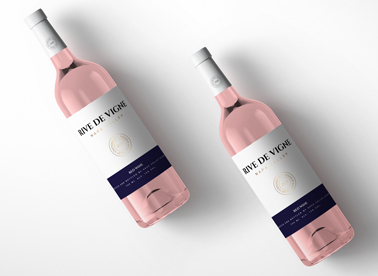 Two Tilted Rose Wine Bottles