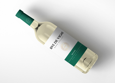 Tilted Wine Bottle on a White Surface
