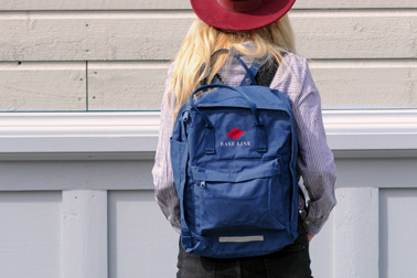 Woman with a Backpack Back View