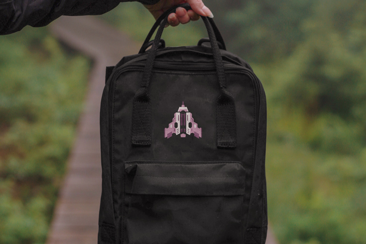 Woman Holding a Backpack Zoom-in View