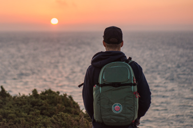 Man with a Backpack Watching the Sunset