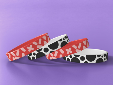 Four Wristbands on a Neutral Background