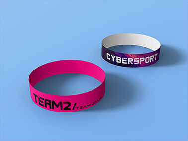 Two Paper Wristbands on a Neutral Surface