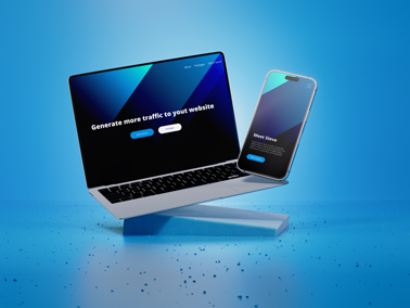 MacBook Pro and an iPhone 14 Pro Max on Top