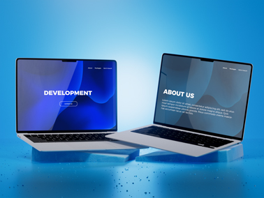 Two MacBook Pros Next to Each Other