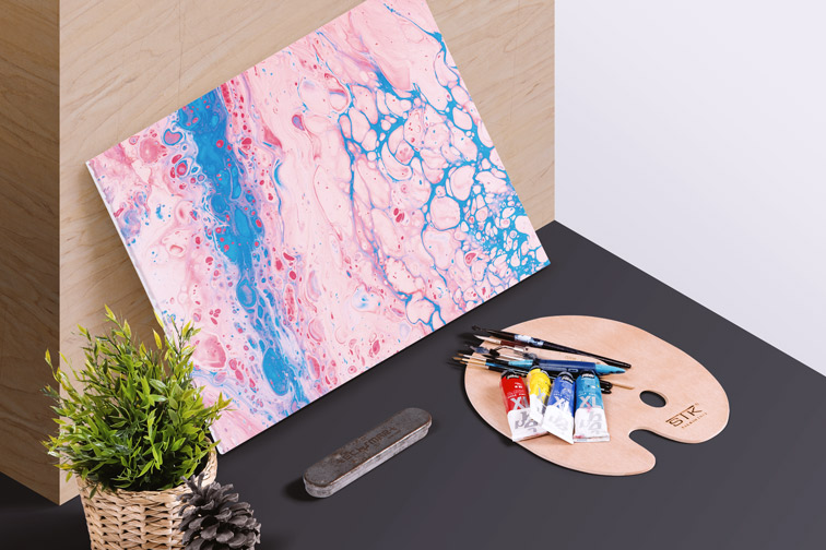 Canvas with an Art Palette and Paint Tubes