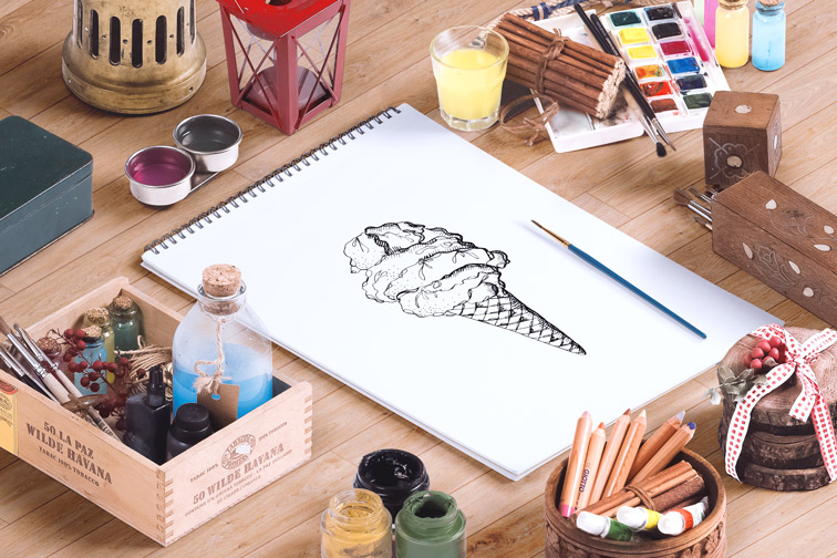 Artist Workspace on a Wooden Background