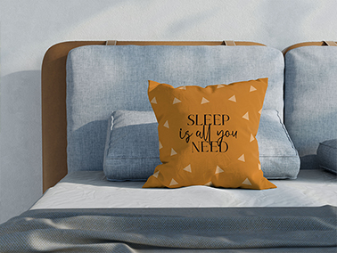 Decorative Pillow on a Bed
