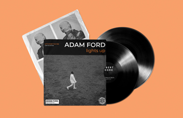 Two Vinyl Records With Covers