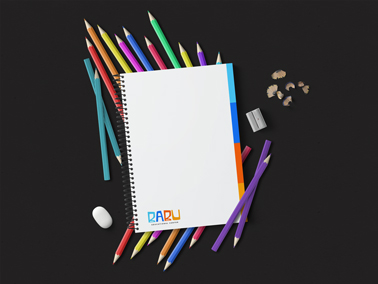 Notebook With Colorful Pencils